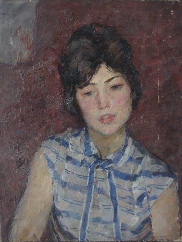 A girl in a stripedsweater